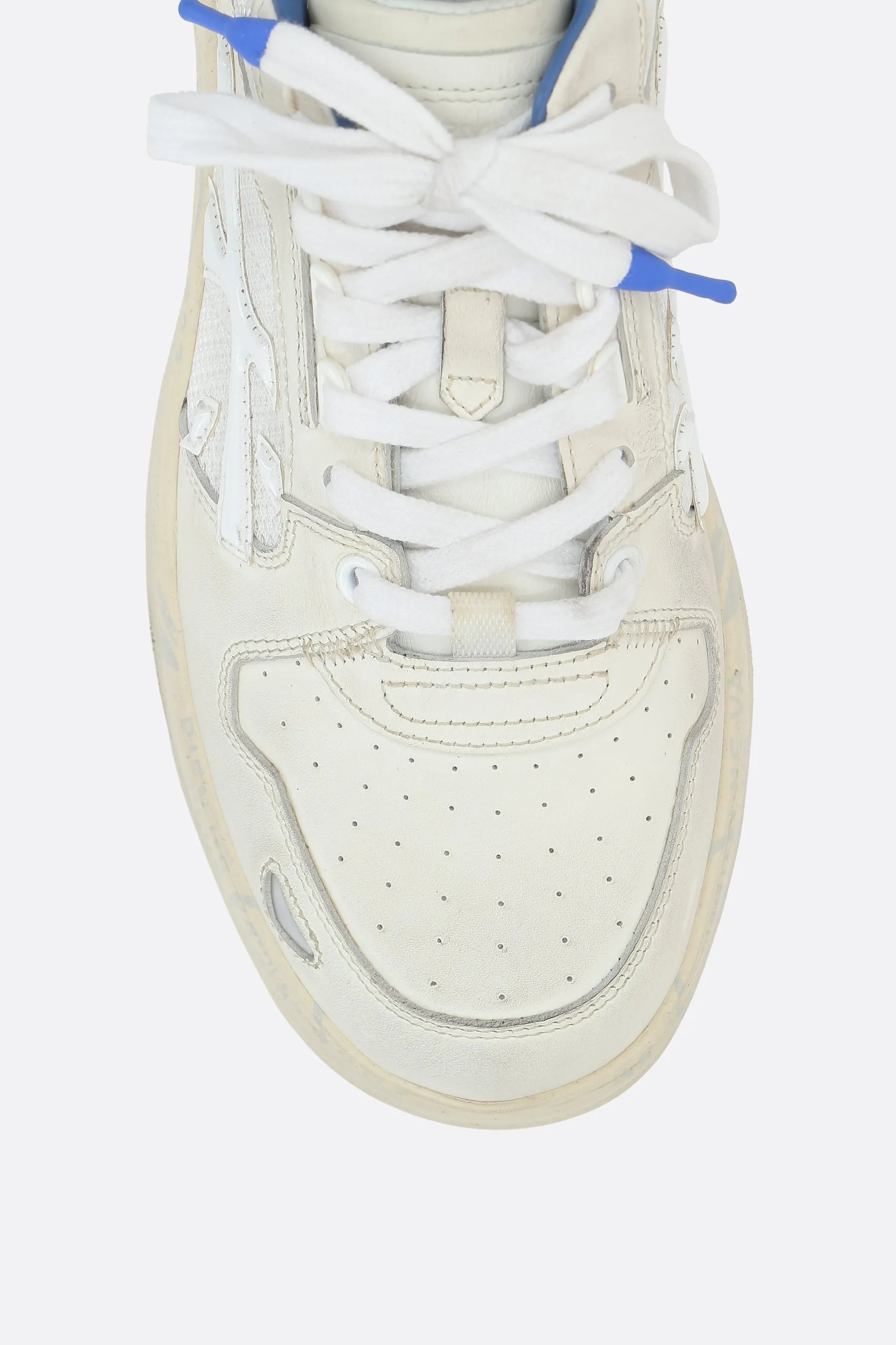 Drake sneakers in a mix of materials
