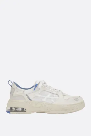 Drake sneakers in a mix of materials